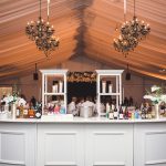 Medallion-Bar-and-Black-Chandeliers.-Photo-courtesy-of-Amber-Bridges-Studio.-Planned-by-Lindsey-Baer-Company.jpg
